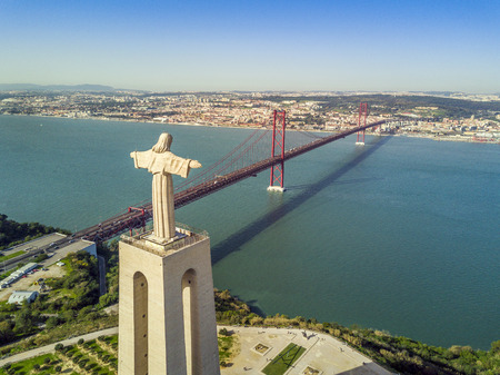 Jesus Christ monument by Tagus river in Lisbon, Portugalの写真素材
