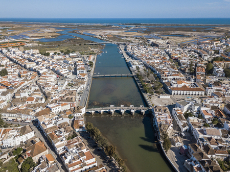 Aerial view of Roman bridge in old fishermen's town called Tavira, Algarve, Portugalの写真素材