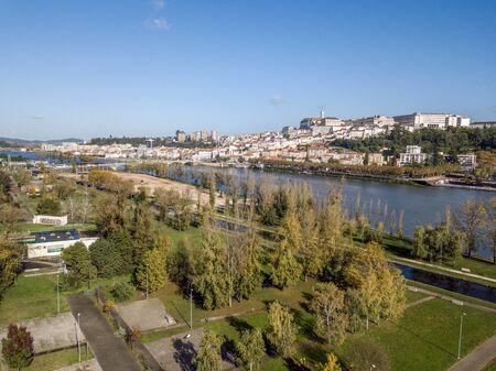 Aerial view of city center of historic Coimbra during sunny day, Portugalの写真素材