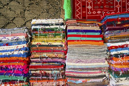 Plenty of famous traditional Berber carpets on sale, Ait Ben Haddou, Moroccoの写真素材