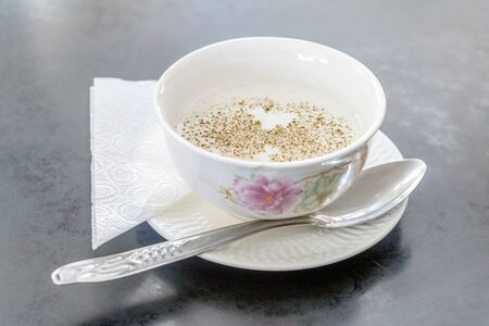Delicious moroccan dairy breakfast - salty porridge in white bowl