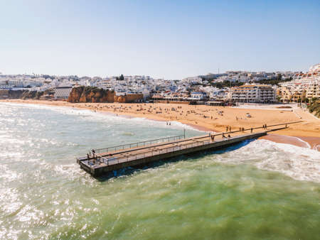 Aerial view of seaside Albufeira with wide beach and white architecture, Algarve, Portugal.のeditorial素材
