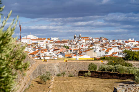 Whitewash architecture of Elvas seen behind fortified walls of the town, Alentejo, Portugal