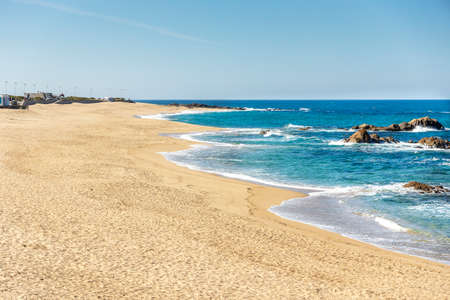 Sandy and rocky coast in Vila do Conde, Porto, North Region, Portugalの写真素材