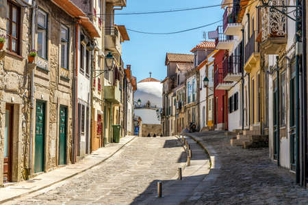Charming street leading to seaside chapel in Vila do Conde, Porto District, North Region, Portugalの写真素材