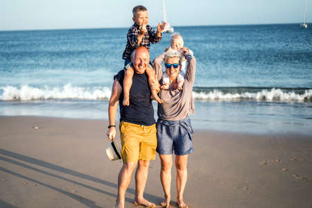 The family with two small boys enjoying time on the beach, Algarve, Portugalの写真素材