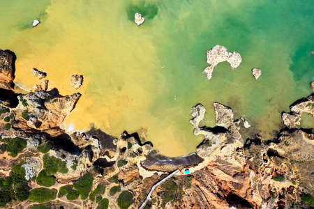 Aerial view of Camilo Beach, Ponta da Piedade, Lagos, Algarve, Portugalのeditorial素材