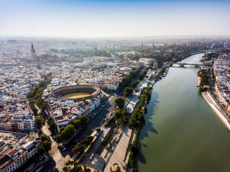 Aerial view of Seville with visible bullring and cathedral tower, Andalusia, Spainのeditorial素材