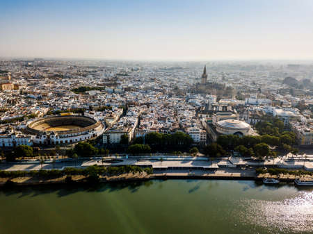 Aerial view of Seville with visible bullring and cathedral tower, Andalusia, Spainのeditorial素材