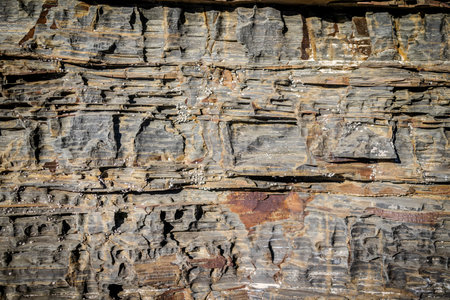 Natural rock pattern shaped by sea waves on the coast of Portugalの写真素材