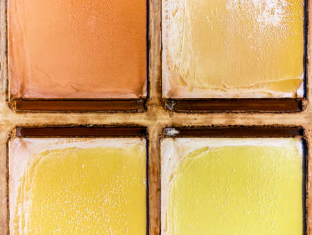 Amazing colors of sea salt ponds called salines shortly before salt harvest in Portugalの写真素材