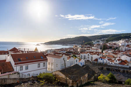 Sesimbra cityscape with historic old town and Atlantic ocean, Setubal region, Portugalの写真素材