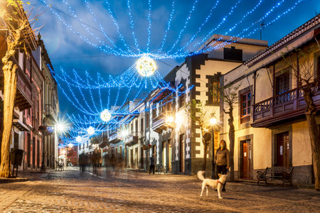 Illuminated main street in historic Teror, Gran Canaria, Canary Islands, Spainの写真素材