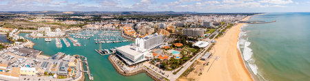 Awesome view of modern, lively and sophisticated Vilamoura Coast one of the largest leisure resorts in Europe, Vilamoura, Algarve, Portugalの写真素材