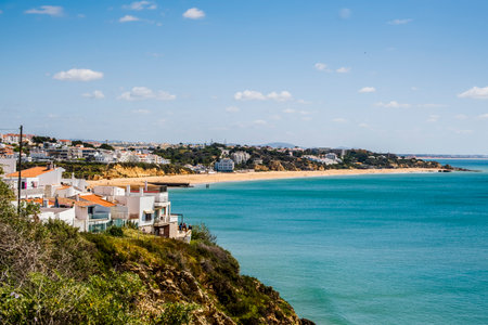 Awesome view of Albufeira Beach, panoramic view, blue sky , tourist and famous place called Praia dos Pescadores or Fisherman Beach in Albufeira, Portugal.の写真素材