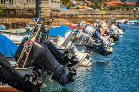 Boats with engines on waterの写真素材
