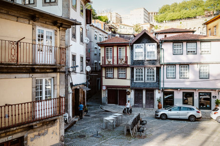 Porto, Portugal - April 17, 2023: Slow morning with people running their errands