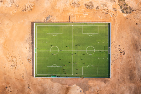 Sports field with players in the middle of the desert on Sal, Cape Verde Islands, Africa