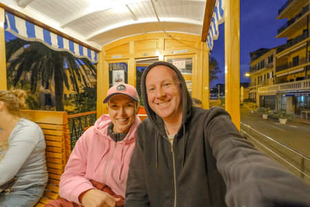 people sitting in the traditional tram in Soller, Mallorca, Spain, Europeの写真素材