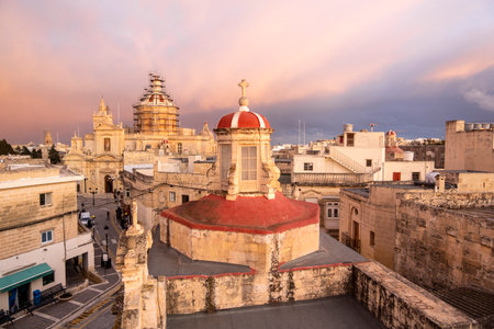 Rabat skyline with St Paul church dome on the left during sunset, Rabat Mdina, Maltaの写真素材
