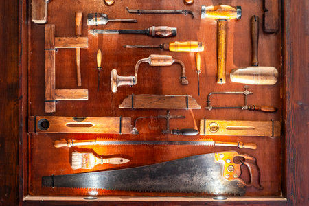 Plenty of different carpenter's tools displayed and illuminated in the museum, Malta