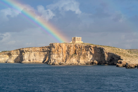 Amazing view of rainbow after the rain above Comino island, Maltaの写真素材