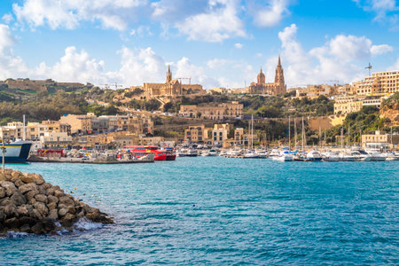 Beautiful view of Mgarr located on Gozo island, the main harbor connecting the island to Malta, Maltaの写真素材