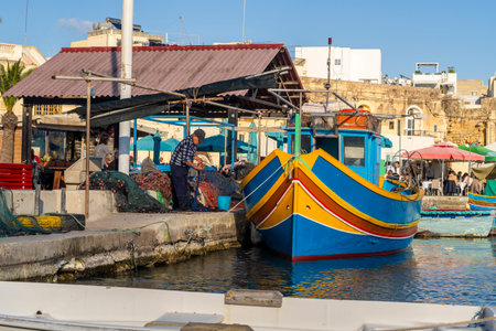 Beautiful view of Marsaxlokk, traditional Maltese fisherman village on south of the island, Maltaの写真素材