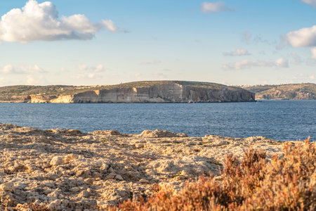 Comino island seen from northern part of Malta, Armier Bay, Maltaの写真素材