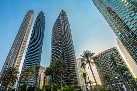 Modern skyline of Abu Dhabi, United Arab Emirates, featuring contemporary architecture, skyscrapers, and waterfront views. A vibrant blend of tradition and modernity in the capital of the UAE.の写真素材