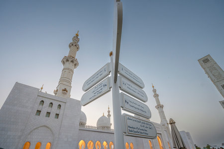 The majestic Sheikh Zayed Grand Mosque in Abu Dhabi, United Arab Emirates, featuring stunning white marble domes, elegant minarets, and intricate Islamic architecture. A symbol of Emirati heritage, faith, and cultural unity.の写真素材