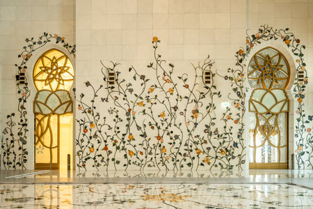 The majestic Sheikh Zayed Grand Mosque in Abu Dhabi, United Arab Emirates, featuring stunning white marble domes, elegant minarets, and intricate Islamic architecture. A symbol of Emirati heritage, faith, and cultural unity.の写真素材