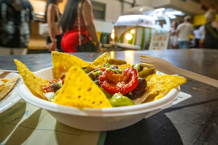 Loule, Algarve, Portugal June26, 2025: Live music performance at the Loule Med Festival 2025. The warm lighting and festive atmosphere capture the essence of Portuguese culture, music, and community celebrationの写真素材
