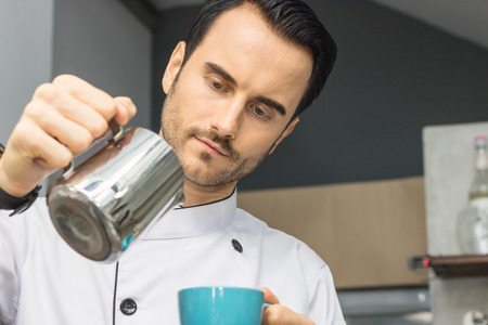 Chef Coffee Maker in  coffee shop in morningの写真素材