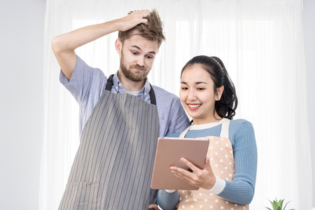 man and woman chef use tabletの写真素材