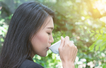 business women driking coffee in the morningの写真素材