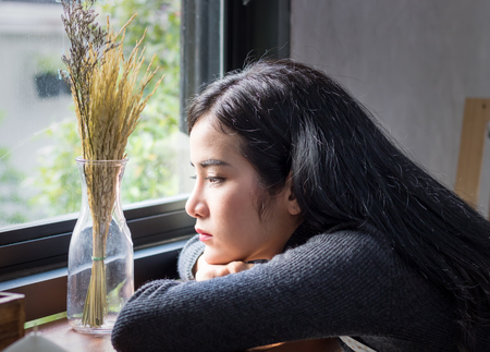 Asian women maid take a break for work hardの写真素材