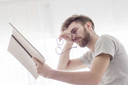 men read book in the morningの写真素材