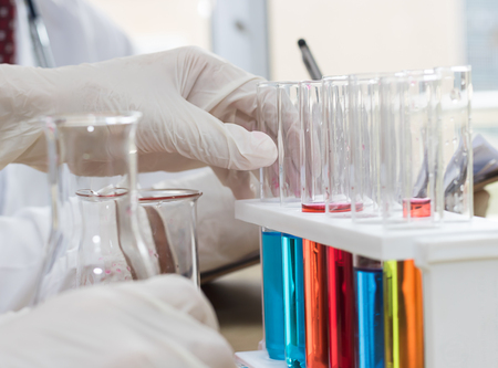 Scientists experiment with green compounds.の写真素材