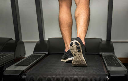 people running on a treadmill in gym for exercisingの写真素材