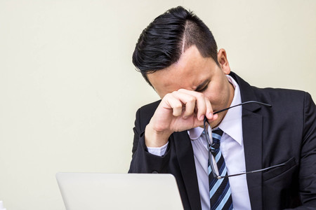 business man strain Because  job unsuccessful with hard jobの写真素材