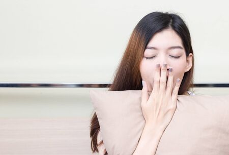 Beautiful Asian women wake up in the morningの写真素材