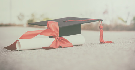 graduate hat and certificated on ground floor.color toneの写真素材