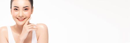 Banner beauty asian women  touching soft cheek portrait face with natural skin and skin care healthy hair and skin close up face beauty portrait.の写真素材
