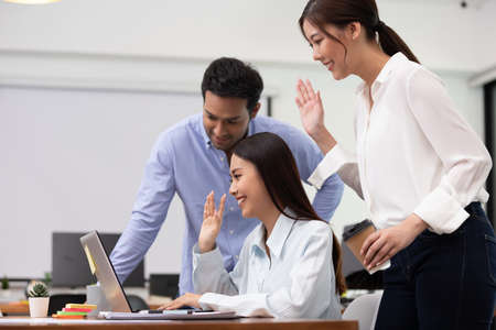Business man and women happy working job on laptop in office.
