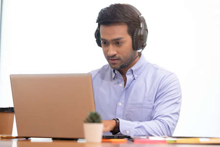 Asian Startup business man meeting with video Conference in office.の写真素材