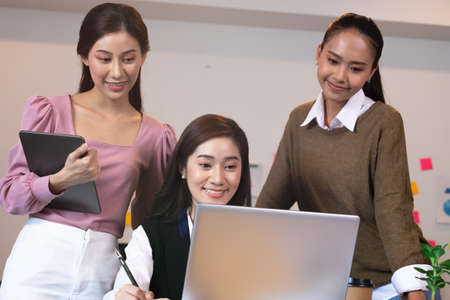 Business man and woman meetting talk about job for branding in office.の写真素材