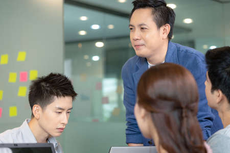 Business man and woman meetting talk about job for branding in office.の写真素材