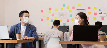 Business man and woman meetting talk about job for branding in office.の写真素材