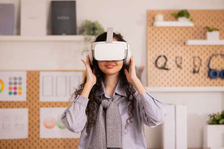 Asian woman designer sitting and thinking about design in the morning at home.の写真素材